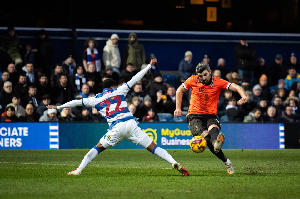 Callum Paterson scoring a goal during a soccer match.