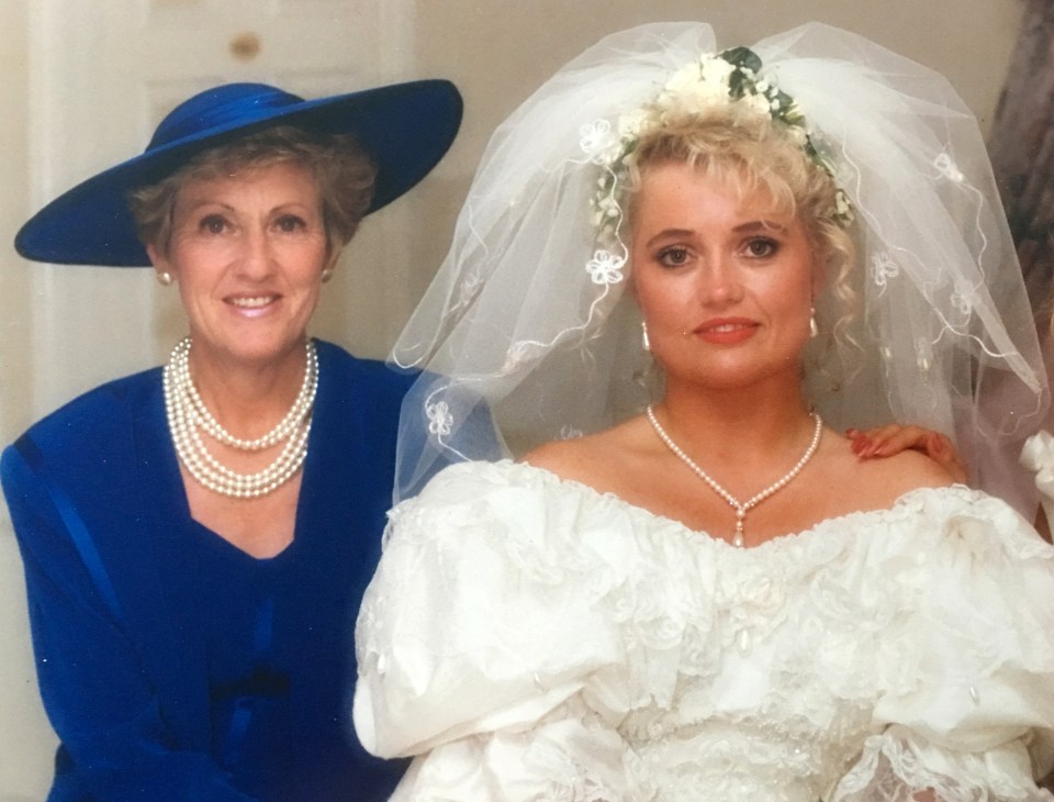 Photo of a mother and daughter at a wedding.