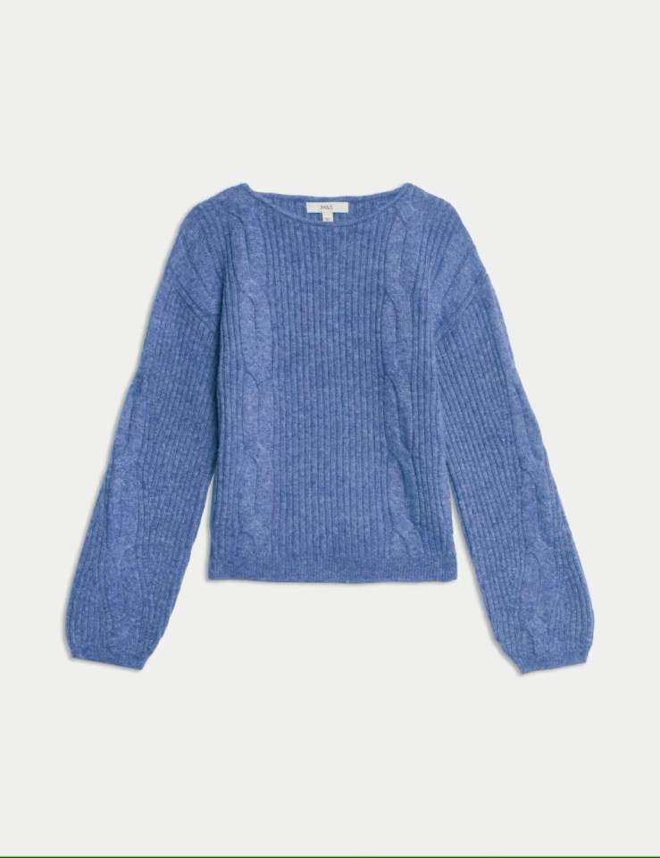 Blue cable knit wool sweater.