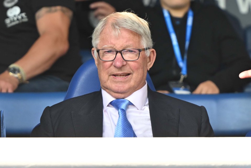 Sir Alex Ferguson watching a soccer match.