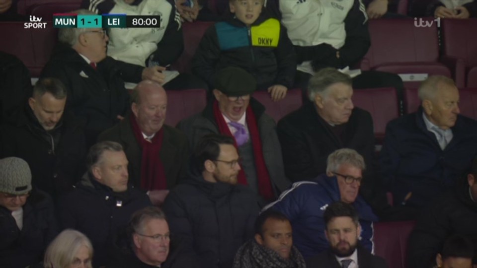 Sir Alex Ferguson yawning at Old Trafford.