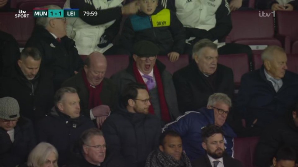 Sir Alex Ferguson yawning at Old Trafford.