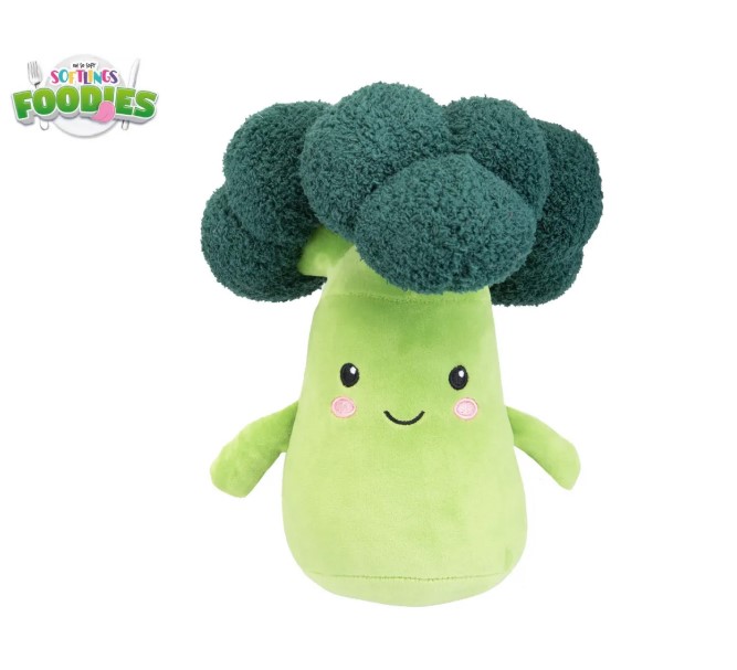 Plush broccoli toy with a smiling face.