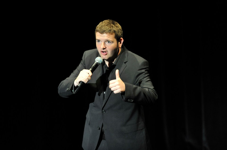 Kevin Bridges performing stand-up comedy.