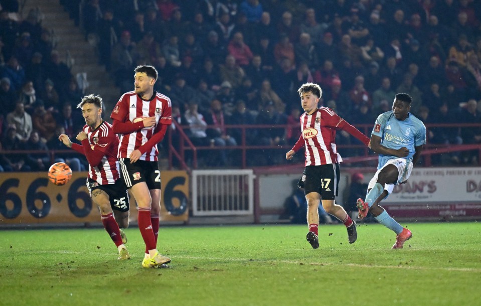 Taiwo Awoniyi of Nottingham Forest scoring a goal during a soccer match.