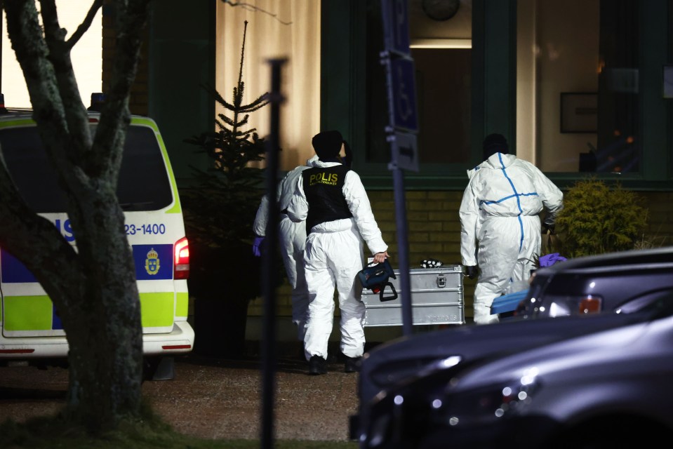 Police forensics at a school shooting crime scene.