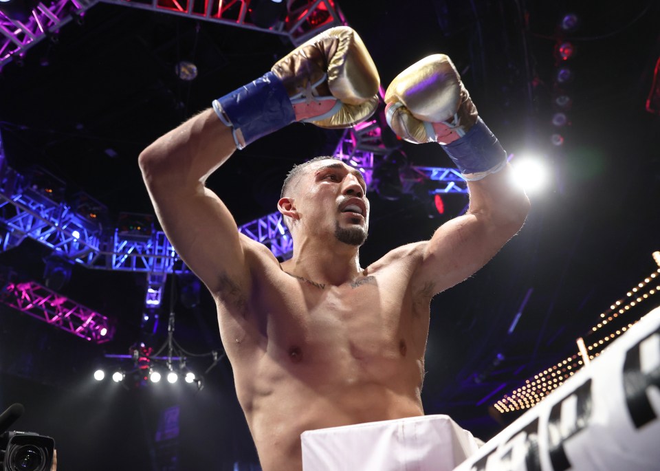 Teofimo Lopez celebrating a boxing victory.