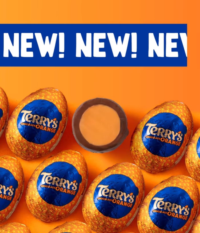 Terry's Chocolate Orange eggs and a single unwrapped chocolate.