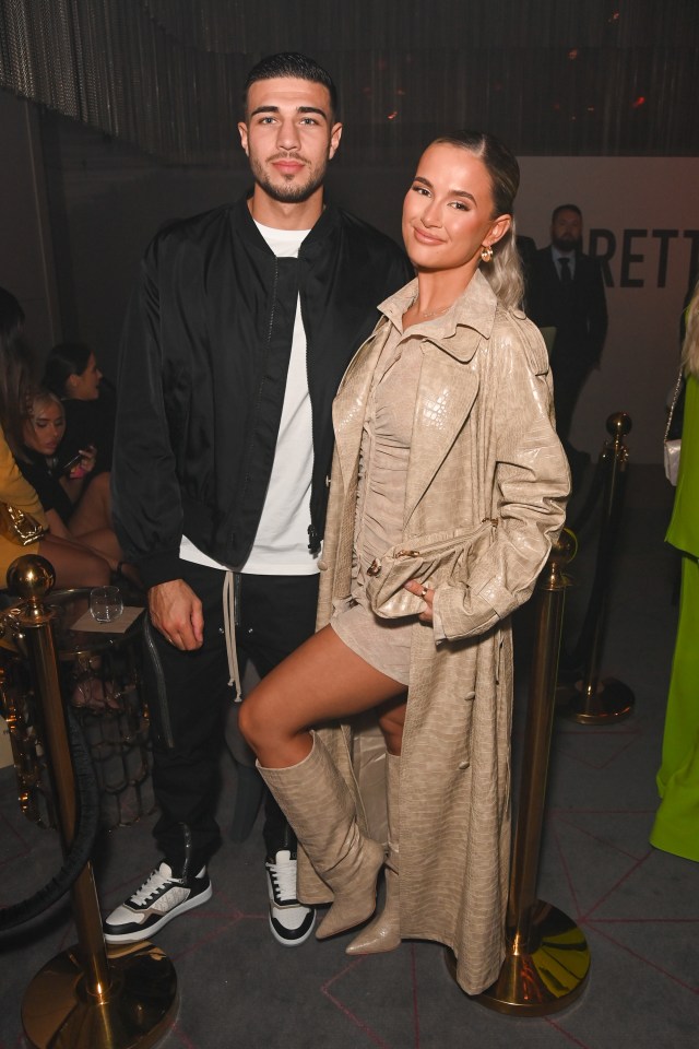 Tommy Fury and Molly-Mae Hague at a fashion event.