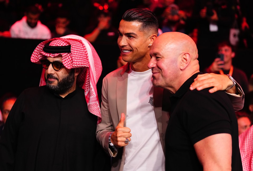 Turki Alalshikh, Cristiano Ronaldo, and Dana White posing for a photo.