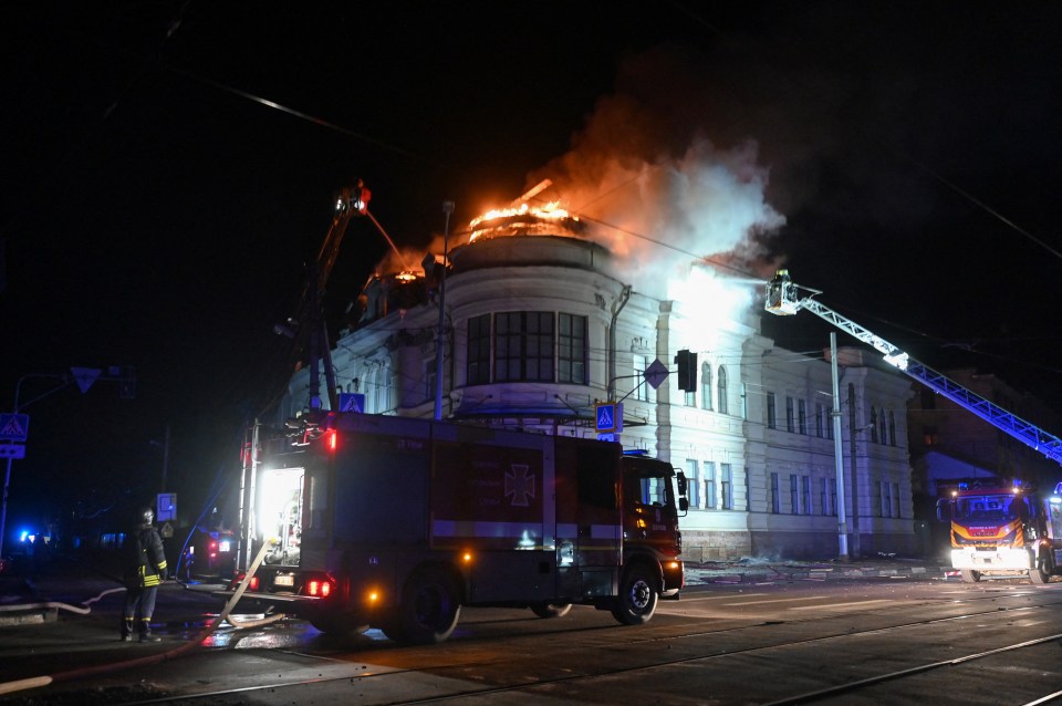 Firefighters extinguishing a building fire in Kharkiv, Ukraine.