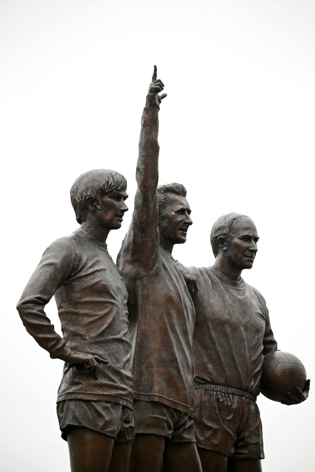 Statue of three Manchester United footballers.