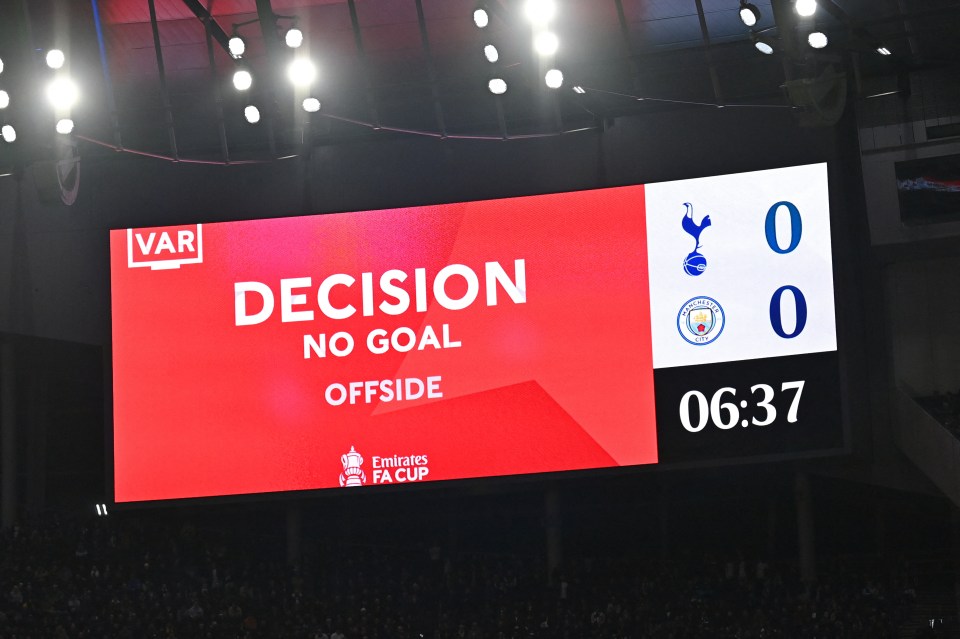 Stadium scoreboard showing a VAR offside decision, the score 0-0, and the time 06:37.