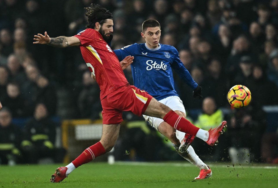 Soccer players vying for the ball.