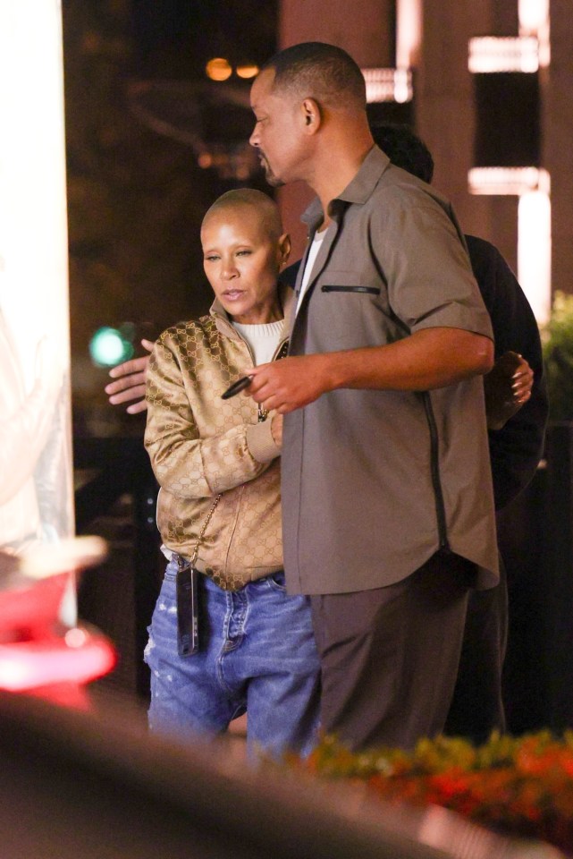 Will Smith and Jada Pinkett Smith leaving a restaurant.