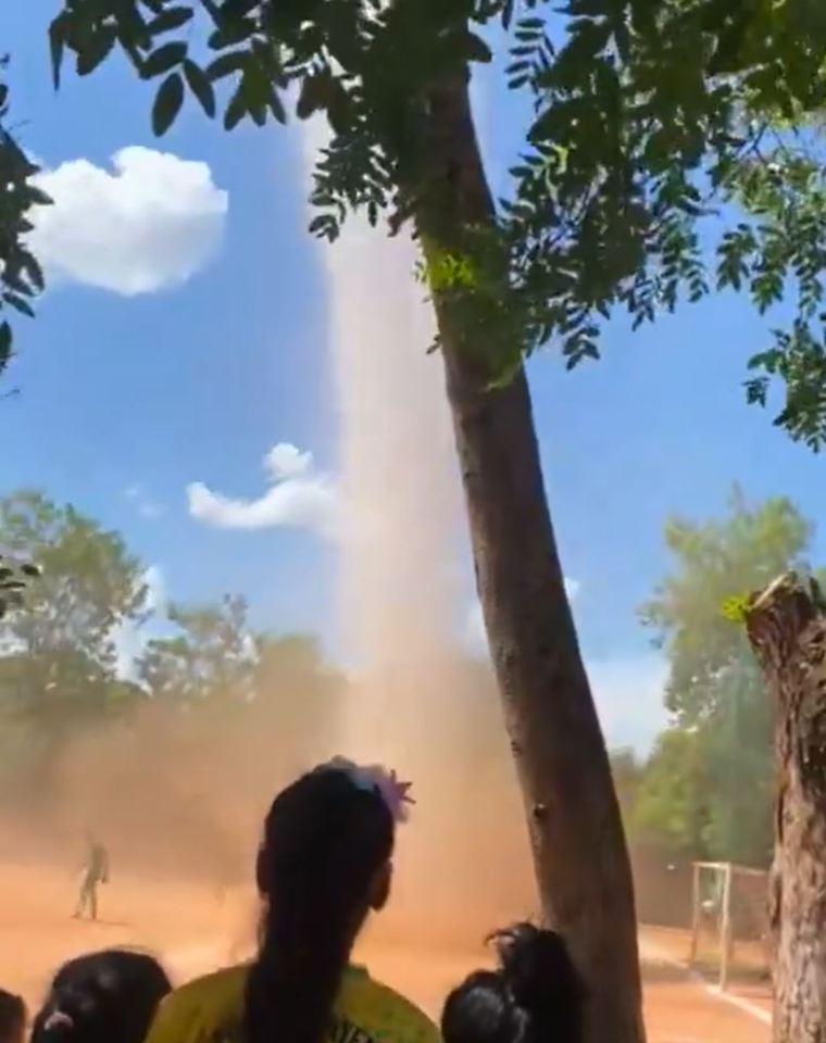 Dust devil at a soccer field.