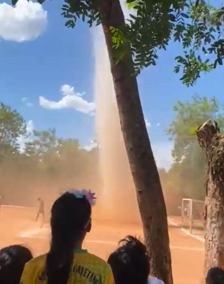 Dust tornado at a soccer match in Paraguay.