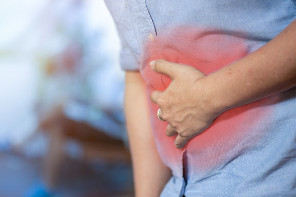 Young man with stomach ache.