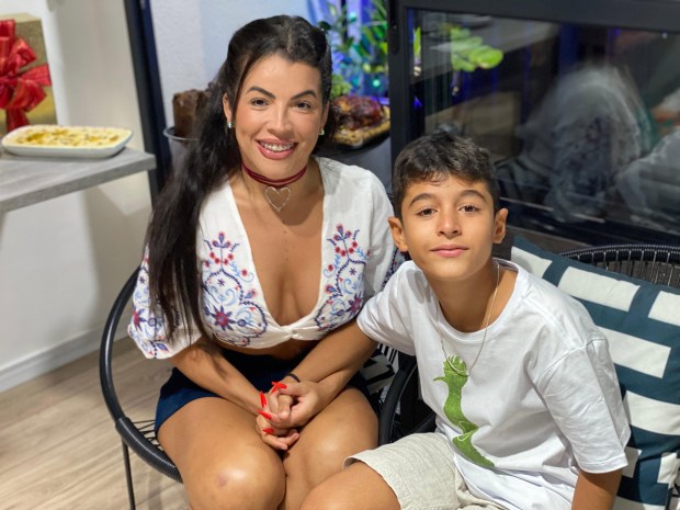 Photo of a mother and son sitting together.