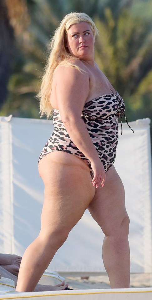 Gemma Collins in a leopard-print swimsuit at the beach.