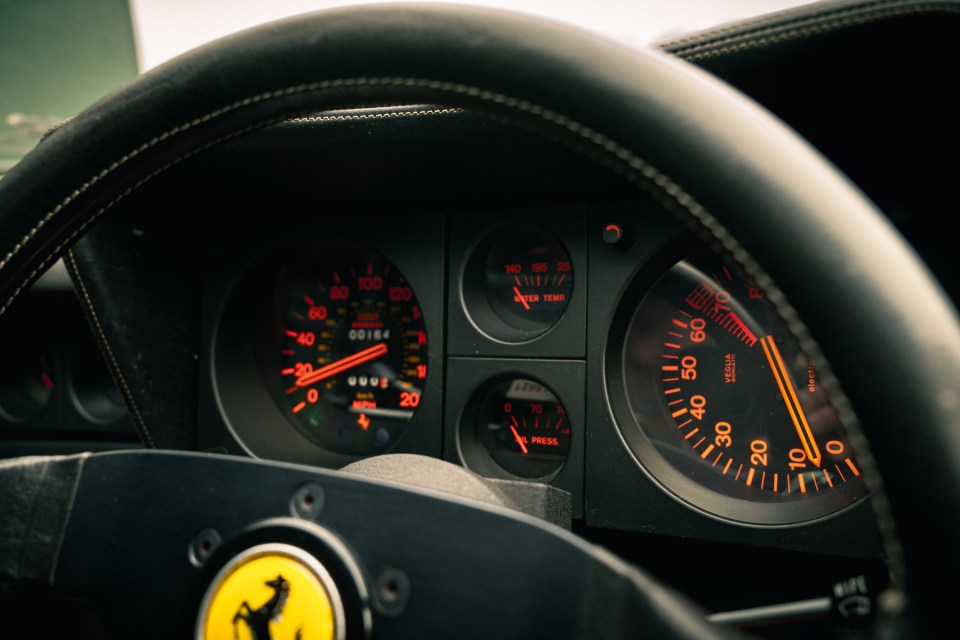 Close-up of a 1977 Ferrari 512 BB's instrument panel.