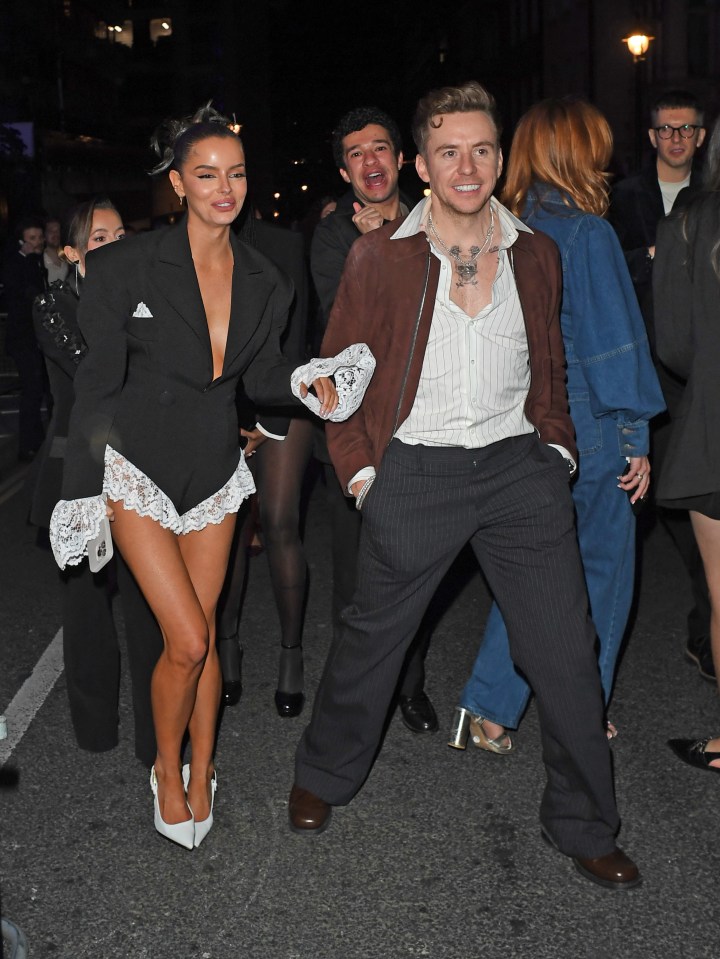 Maura Higgins and Danny Jones leaving a party.