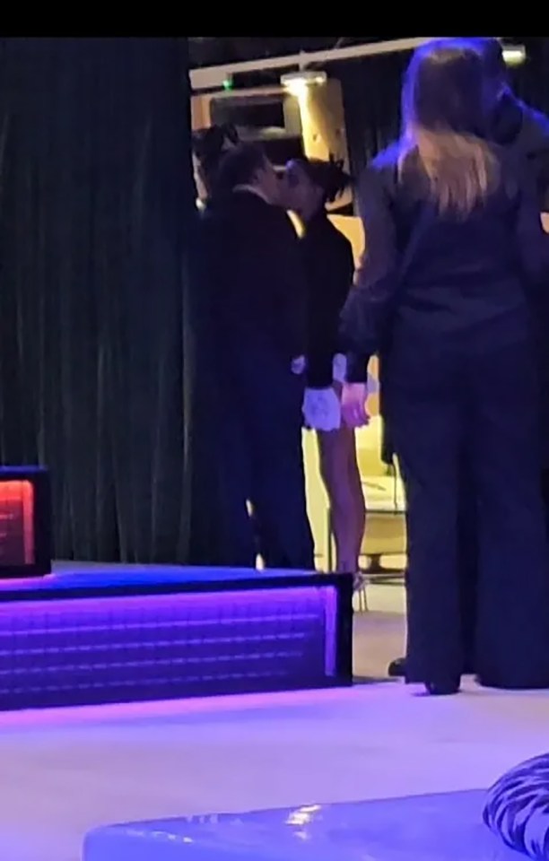 Maura Higgins and Danny Jones kissing at a Brit Awards after-party.