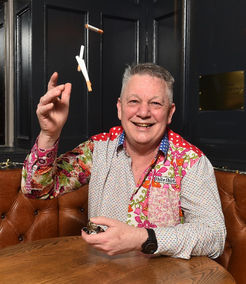 Man tossing cigarettes in the air after taking a drug to quit smoking.