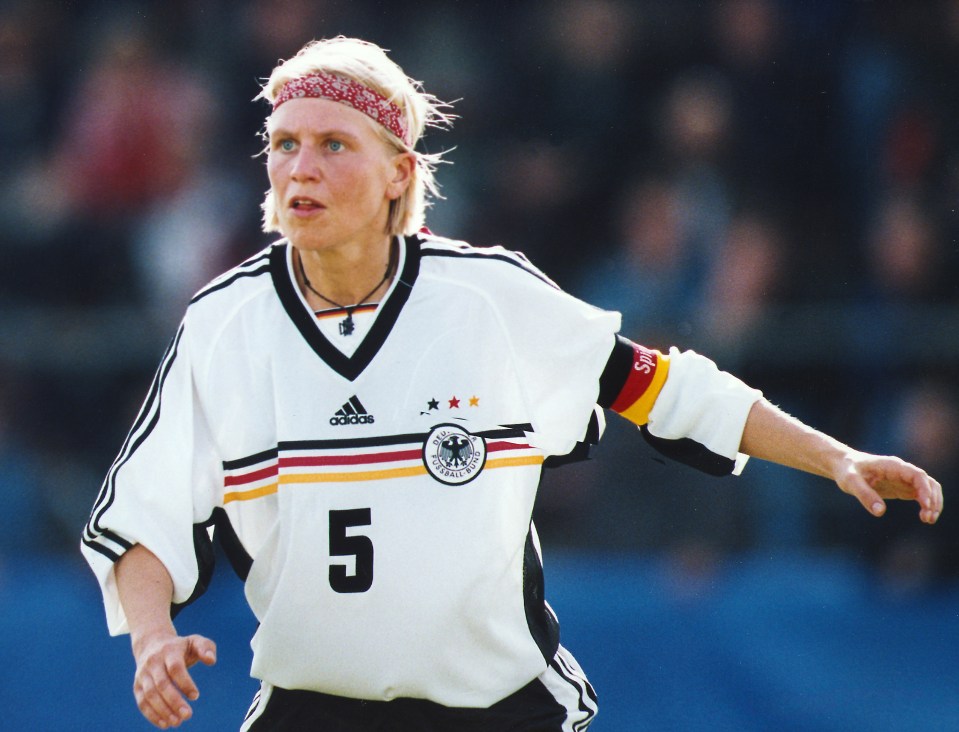 A female soccer player wearing a German national team jersey.