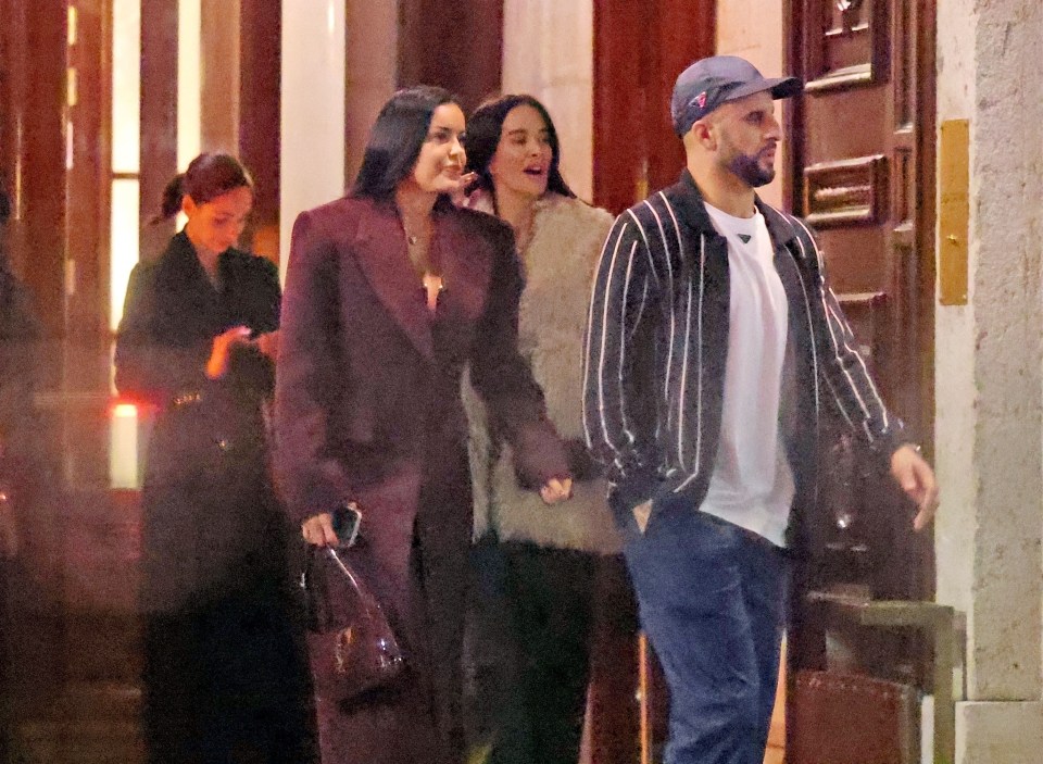 Kyle Walker leaving Casa Cipriani with two women.