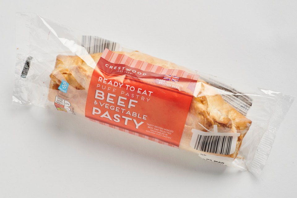 Beef and vegetable pasty in plastic packaging.