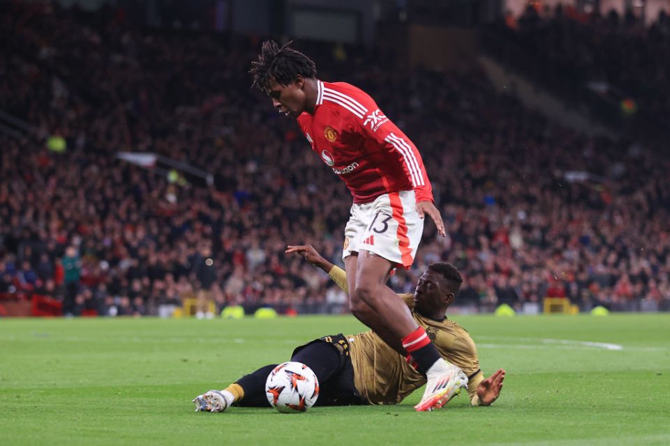 MANCHESTER, ENGLAND - MARCH 13: Hamary Traore of Real Sociedad tackles Patrick Dorgu of Manchester United during the UEFA Europa League 2024/25 Round of 16 Second Leg match between Manchester United and Real Sociedad de Futbol at Old Trafford on March 13, 2025 in Manchester, England. (Photo by Simon Stacpoole/Offside/Offside via Getty Images)