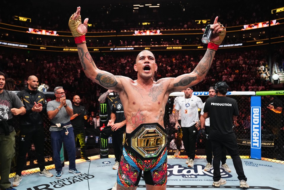 Alex Pereira celebrates his UFC light heavyweight championship victory.