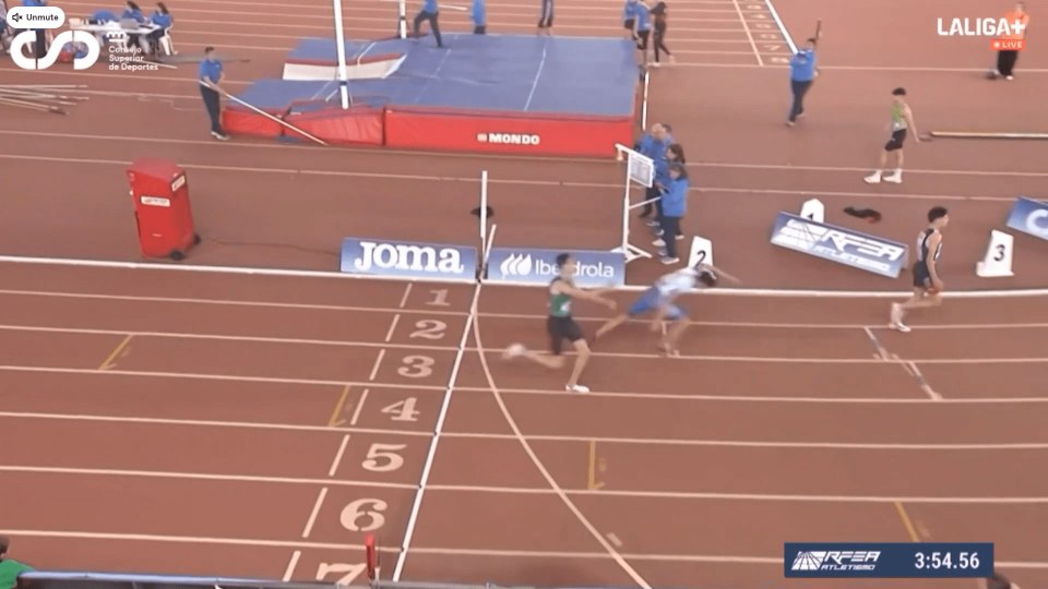 Athlete disqualified for pushing another athlete near the finish line.