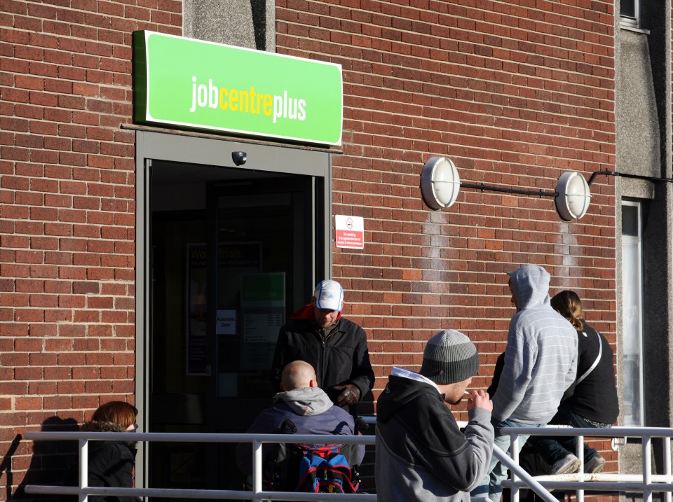 People waiting outside a Job Centre Plus.