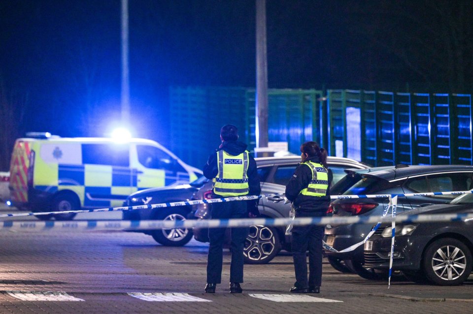 Police officers at a crime scene.