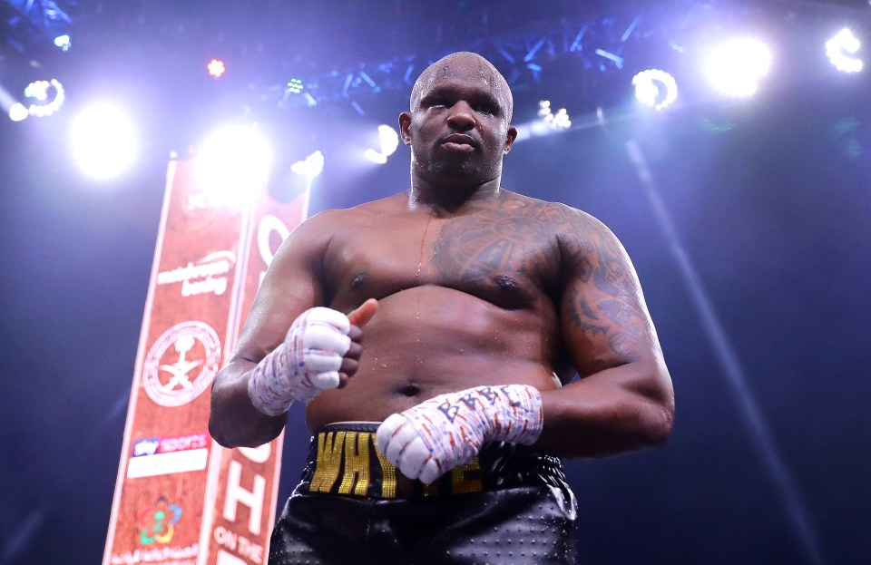 Dillian Whyte posing after a heavyweight boxing match.