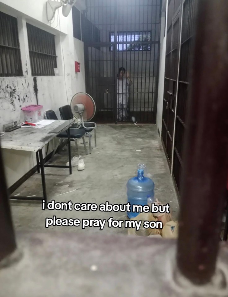 A woman and her young son in a Thai detention center.