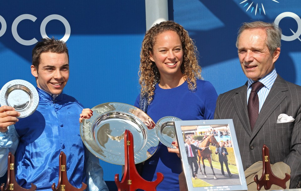 Jockey Maxime Guyon, owner Diane Wildenstein, and trainer Andre Fabre with trophies after winning the 1000 Guineas.