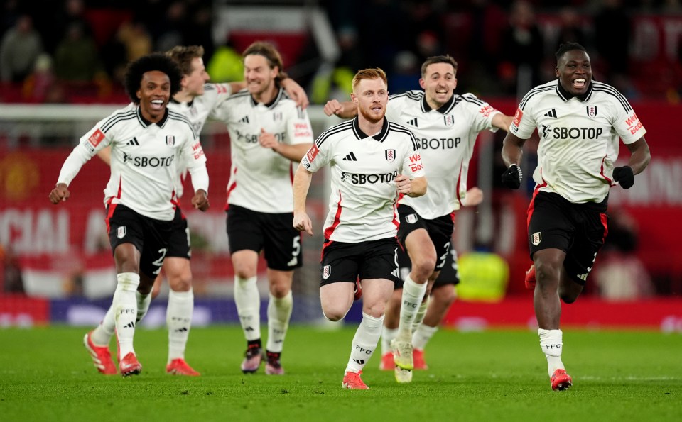 Fulham soccer players celebrating after a match.