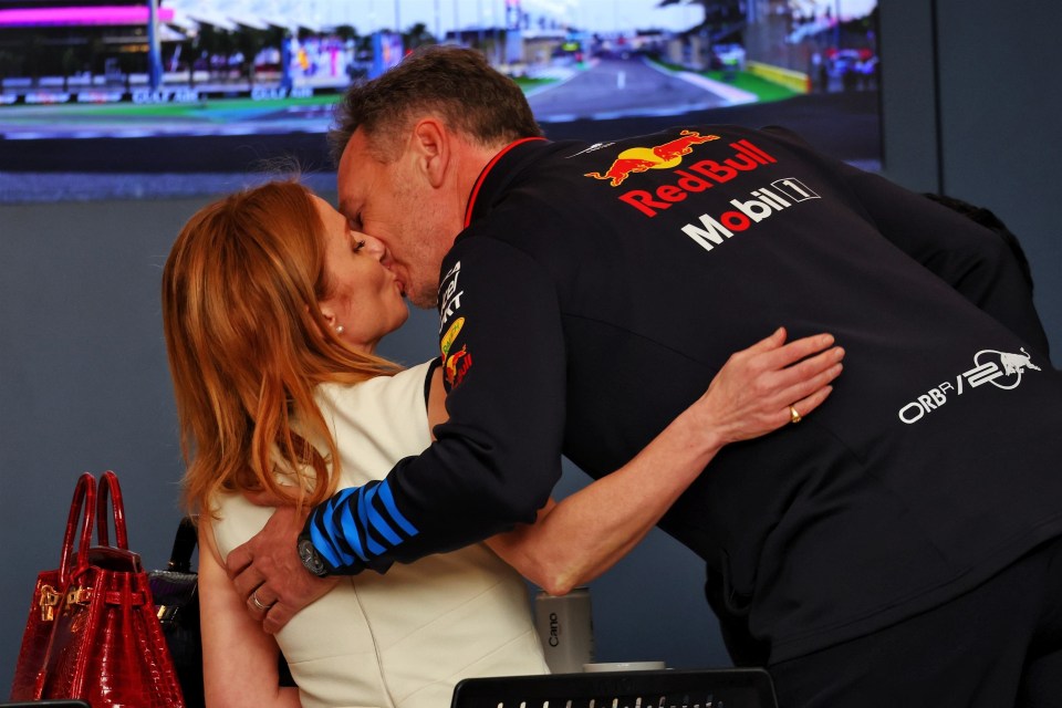 Geri Horner and Christian Horner kissing.