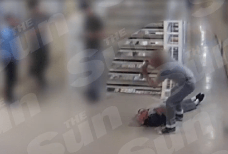 A person assaulting another person on the ground.