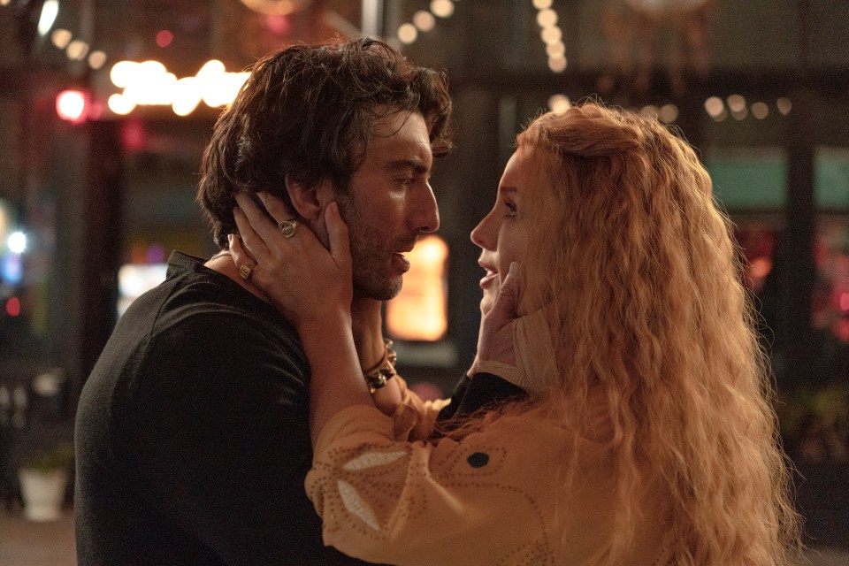 Scene from "It Ends With Us" showing Justin Baldoni and Blake Lively embracing.