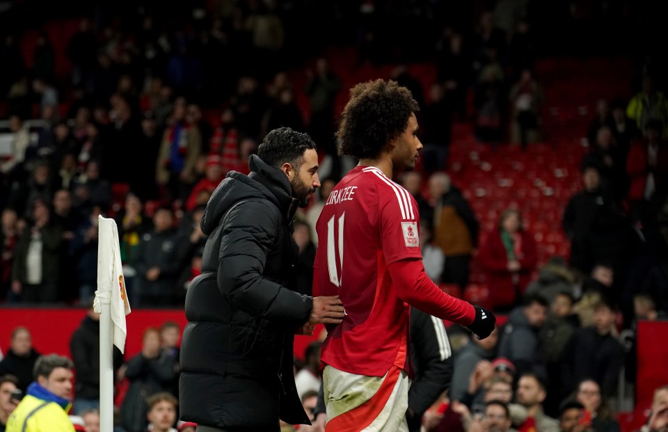 Ruben Amorim consoling a Manchester United player after a penalty shootout.