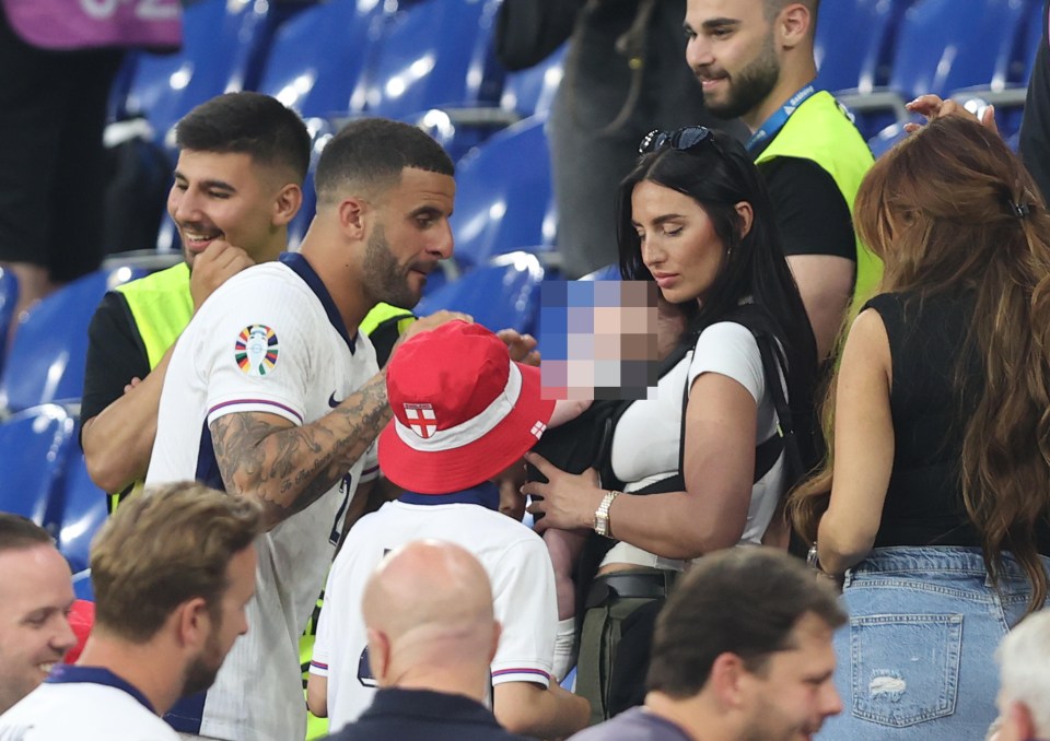 Kyle Walker of England with his family at a soccer match.