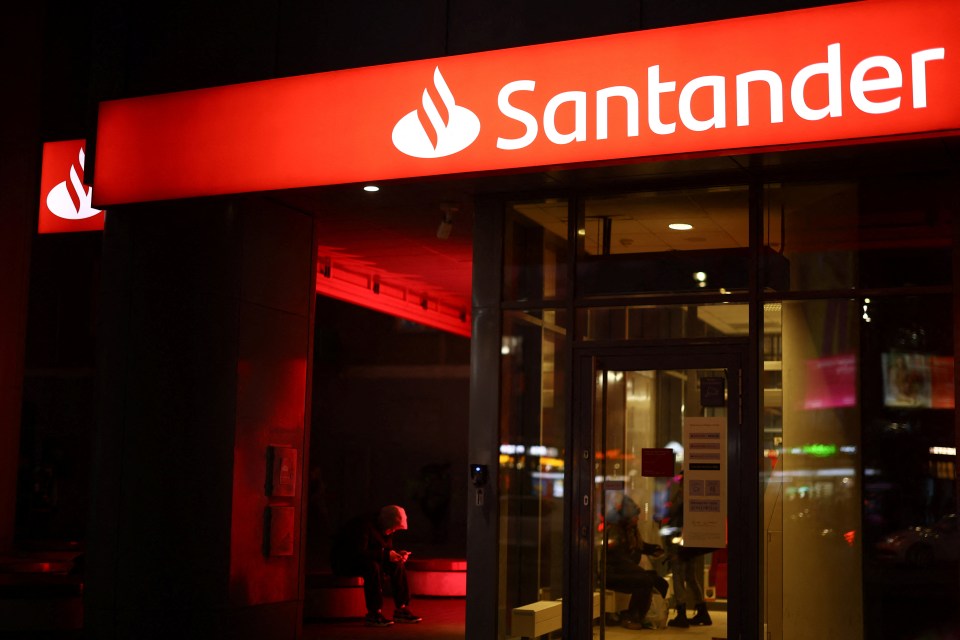 Santander Bank Polska branch at night.