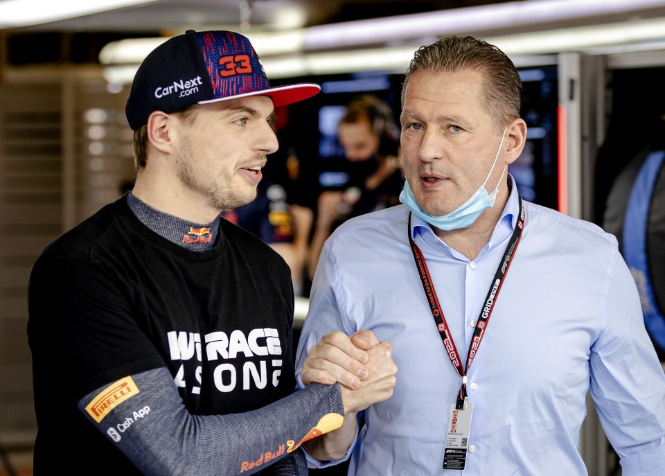 Max Verstappen shaking hands with his father, Jos Verstappen.