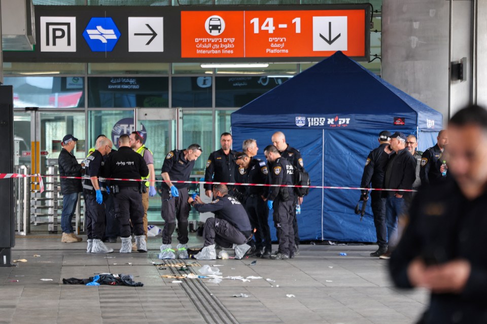 Israeli security and emergency services at the scene of a stabbing attack.