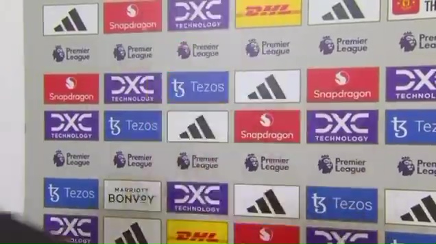 Wall of sponsor logos.