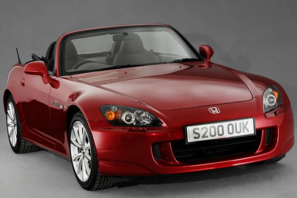 An image collage containing 1 images, Image 1 shows Red Honda S2000 convertible